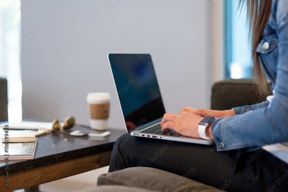 Typing on a laptop Typing on a laptop
