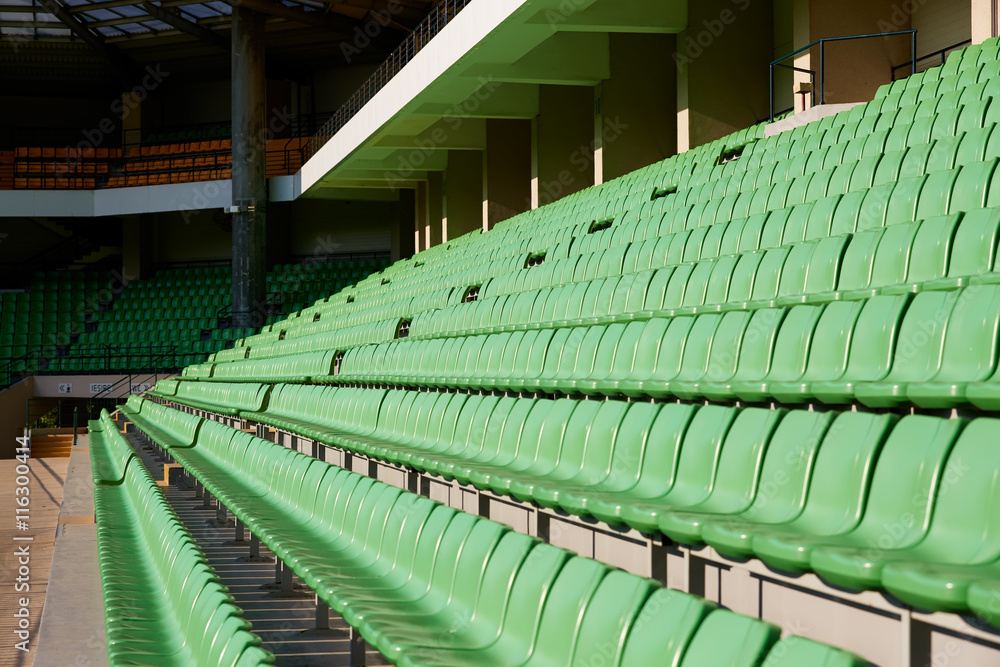 Fototapeta premium empty football stadium chairs
