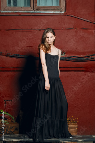 fashion model in long designers black dress in night show © boomeart