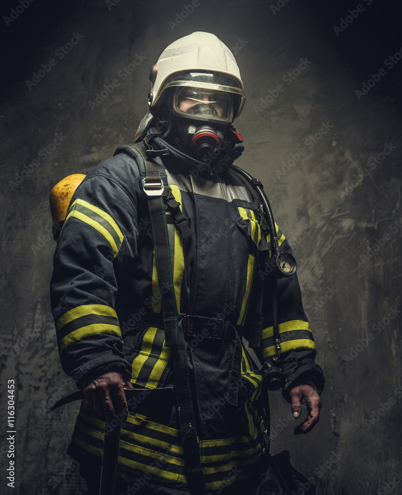Portrait of firefighter in oxygen mask.