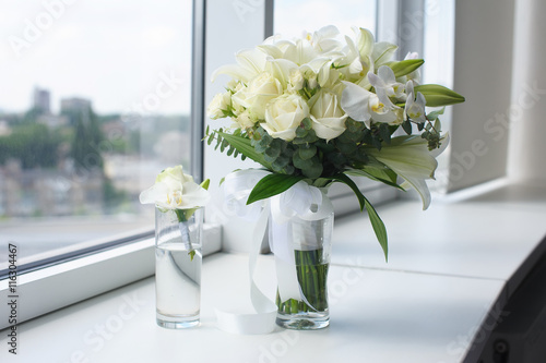 Beautiful wedding bouquet in a glass vase