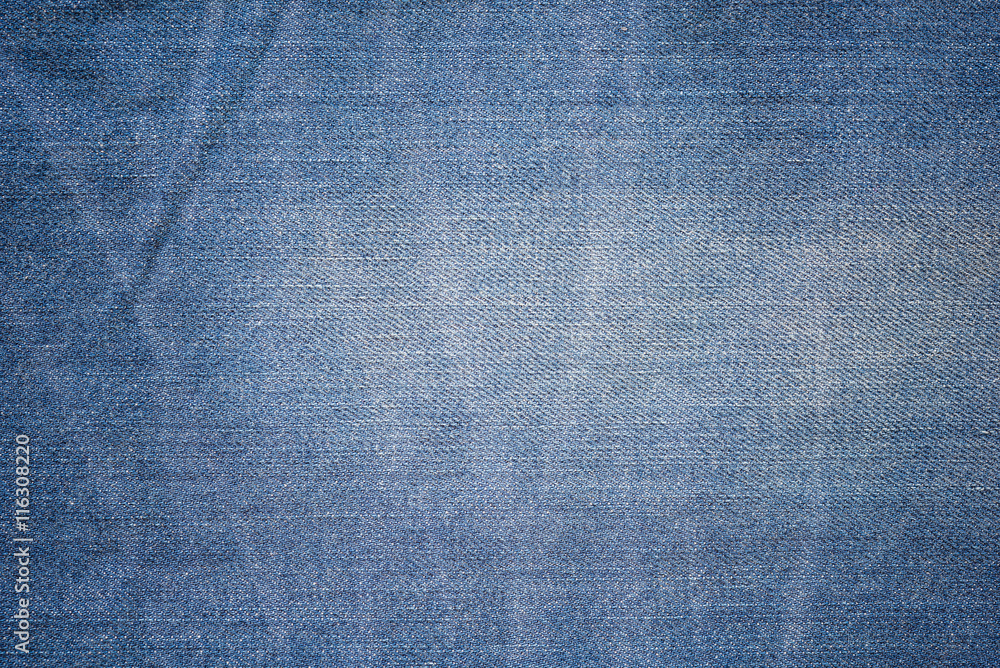 Closeup denim jeans texture. Stitched textured blue denim jeans Closeup denim jeans texture. Stitched textured blue denim jeans