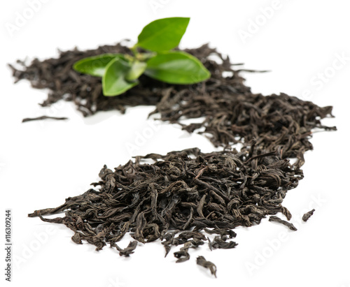 Black tea and green leaves