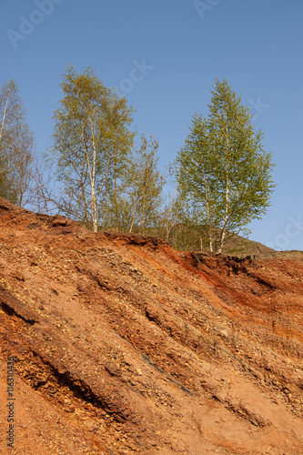 Waste heaps of red rock Chervonograd geological and industrial district