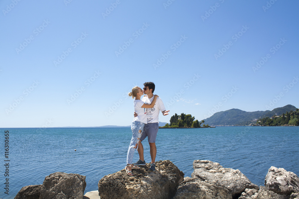 Romantic couple in Corfu island. Holidays in Greece. Mouse island. Romantic couple in Corfu island. Holidays in Greece. Mouse island.