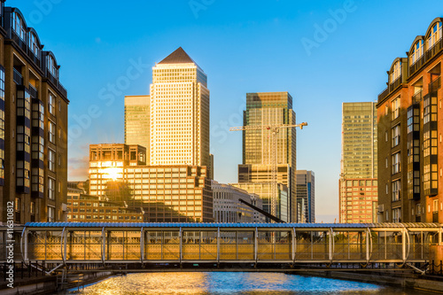 Canary Wharf seen from Nelson Dock Pier in London at sunset photo