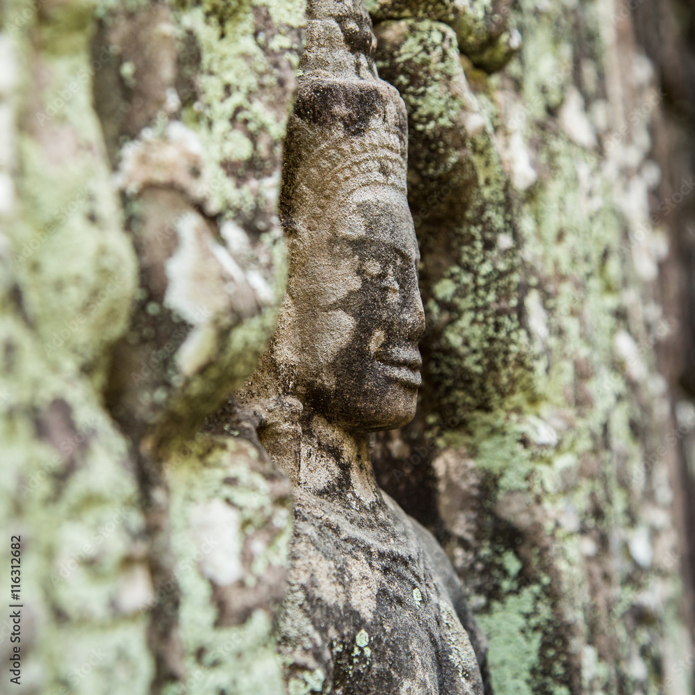 Fototapeta premium Statue in the temple's wall