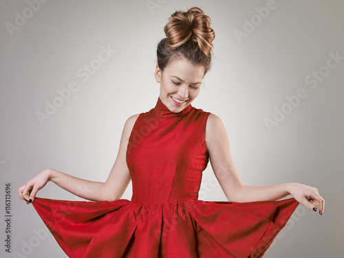 Funny girl makes curtsy photo