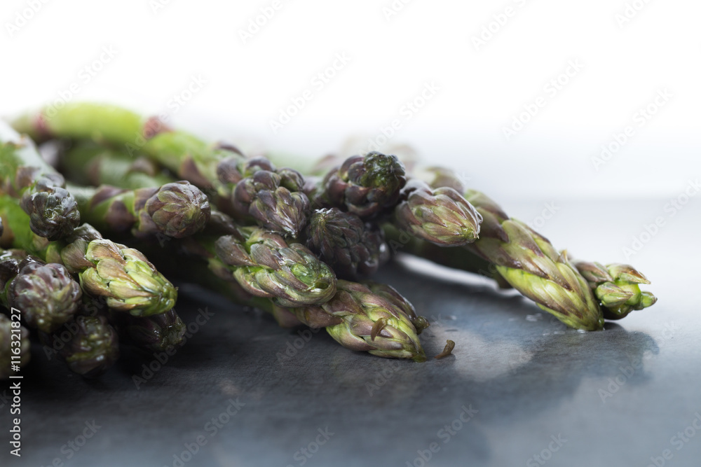 Bunch of asparagus on a table. Uncooked pile raw for organic, vegetarian cuisine, delicious fresh, healthy ingredient. Closeup and copy space.
Bunch of asparagus on a table. Uncooked pile raw for organic, vegetarian cuisine, delicious fresh, healthy ingredient. Closeup and copy space.