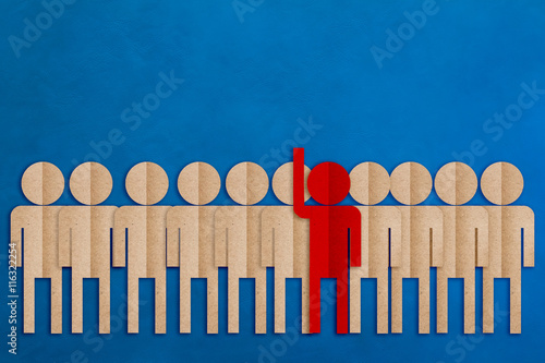 red man paper cut raise hand among the others business leader co photo