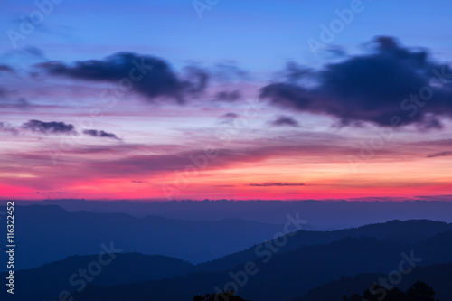 Mountain complex and colorful sky for background.