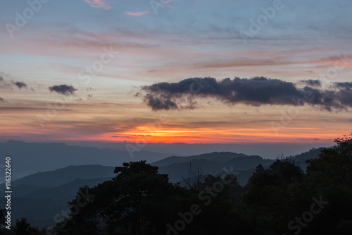 Mountain complex and colorful sky for background. © oatfeelgood