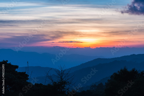 Mountain complex and colorful sky for background.