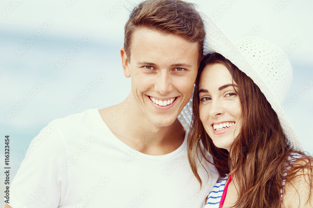 Romantic young couple on the beach Romantic young couple on the beach