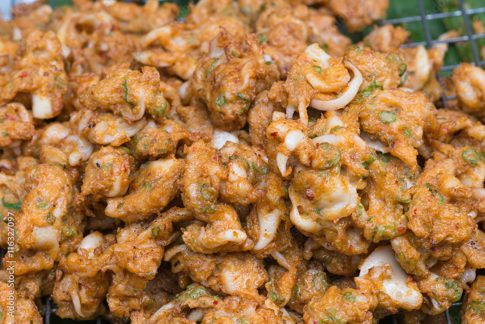 Curried squid cake or fried fish cake with squid (Tod Mun), Thai food style Curried squid cake or fried fish cake with squid (Tod Mun), Thai food style