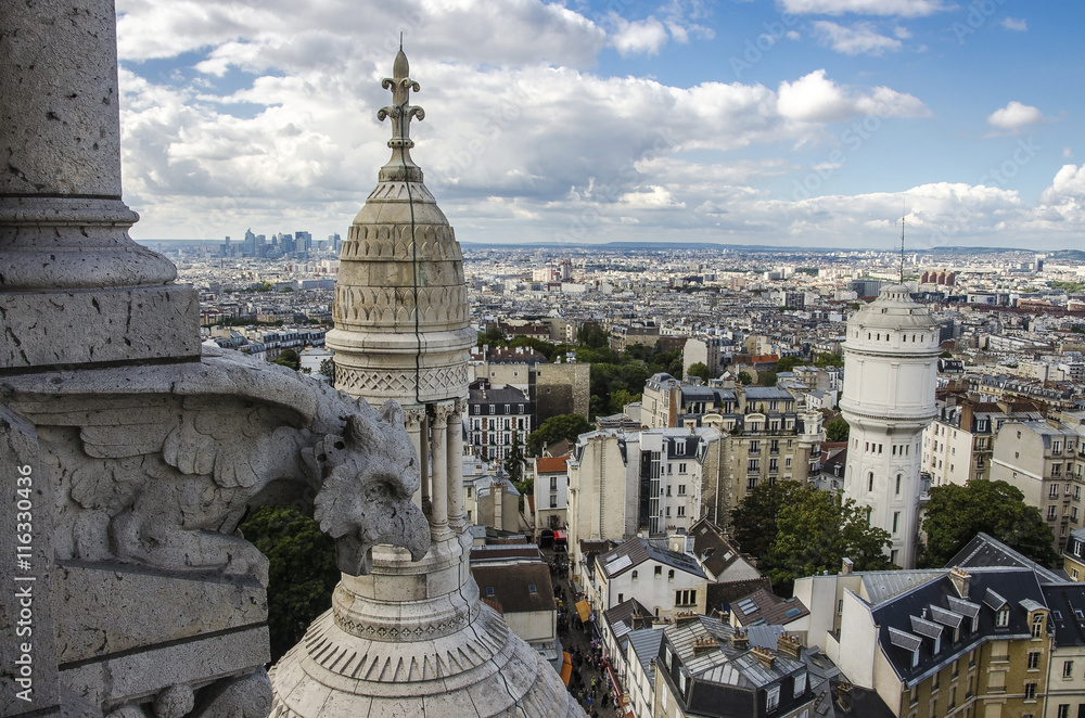A detail of the Sacre-Coeur church (Montmartre) and panorama view of Paris