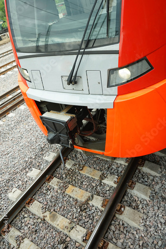 ectric train on the railway. Vertical image. photo