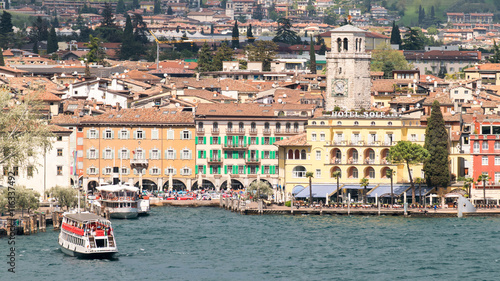 Fototapeta Naklejka Na Ścianę i Meble -  The town of Riva del Garda seen from the lake.