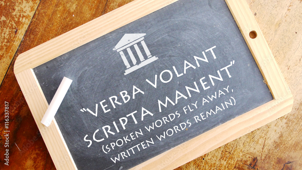 Verba volant scripta manent. Latin phrase meaning "spoken words fly away,  written words remain". Stock Photo | Adobe Stock