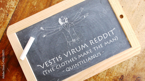 Vestis virum reddit. A Latin phrase meaning “The clothes make the man”. photo