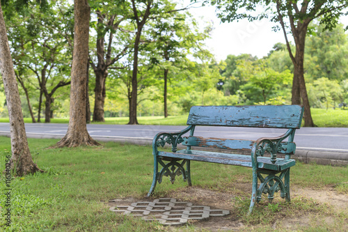 Empty old wooden bench in the city park. © icestylecg