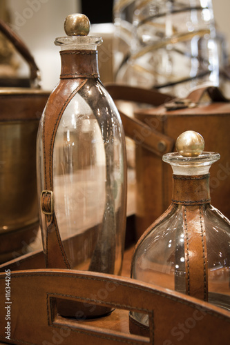 Bottles and leather tray decoration