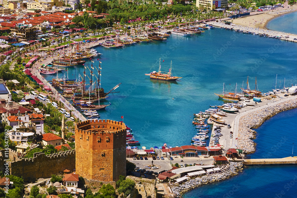 Turkey. Alanya. Aerial view from the Citadel of Alanya on the Red Tower (Kizil Kule) and marina