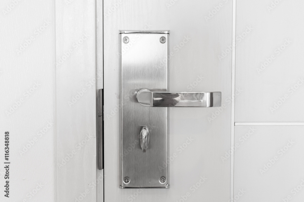 Obraz premium Handle steel knob on the door