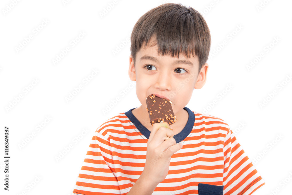 Little boy eating chocolate icecream with happy face summer time Little boy eating chocolate icecream with happy face summer time