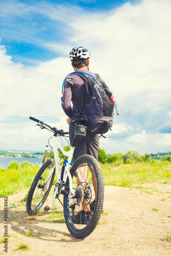 A cyclist with a backpack.