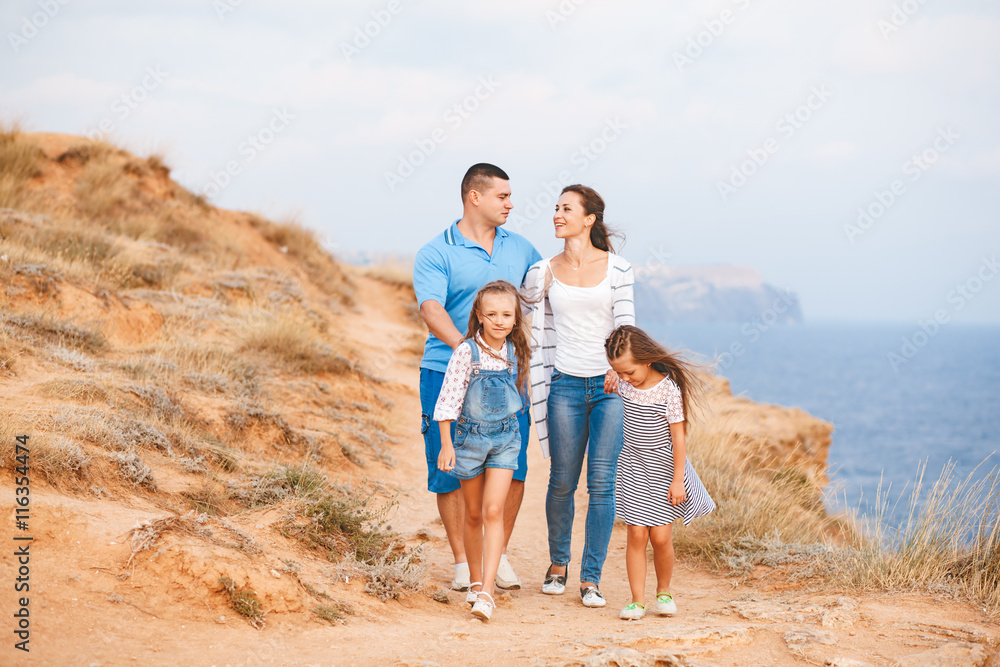 Family on the sea shore