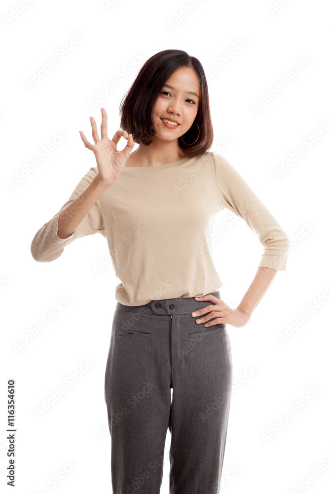 Young Asian woman show OK sign isolated on white background Young Asian woman show OK sign isolated on white background