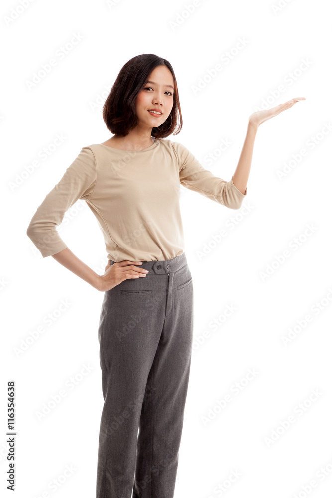 Young Asian woman present with her hand isolated on white background Young Asian woman present with her hand isolated on white background