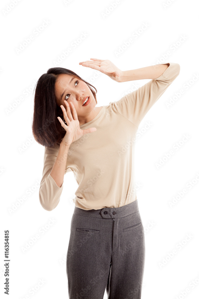 Excited young Asian business woman look up isolated on white background Excited young Asian business woman look up isolated on white background