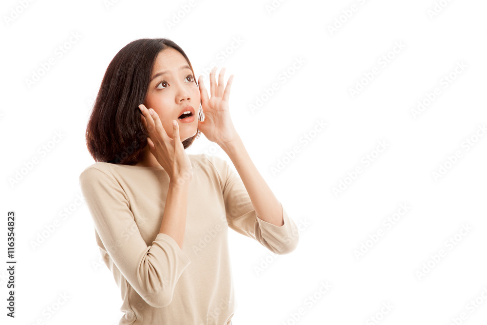 Beautiful young Asian woman shocked and look up isolated on white background Beautiful young Asian woman shocked and look up isolated on white background