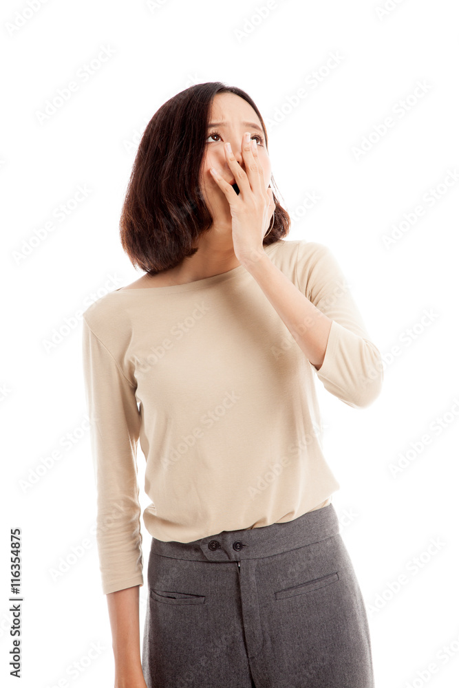 Sleepy young Asian woman yawn isolated on white background Sleepy young Asian woman yawn isolated on white background