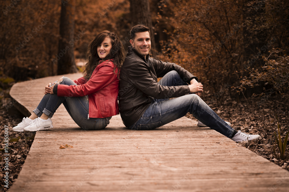 couple kissing outdoor in the park couple kissing outdoor in the park