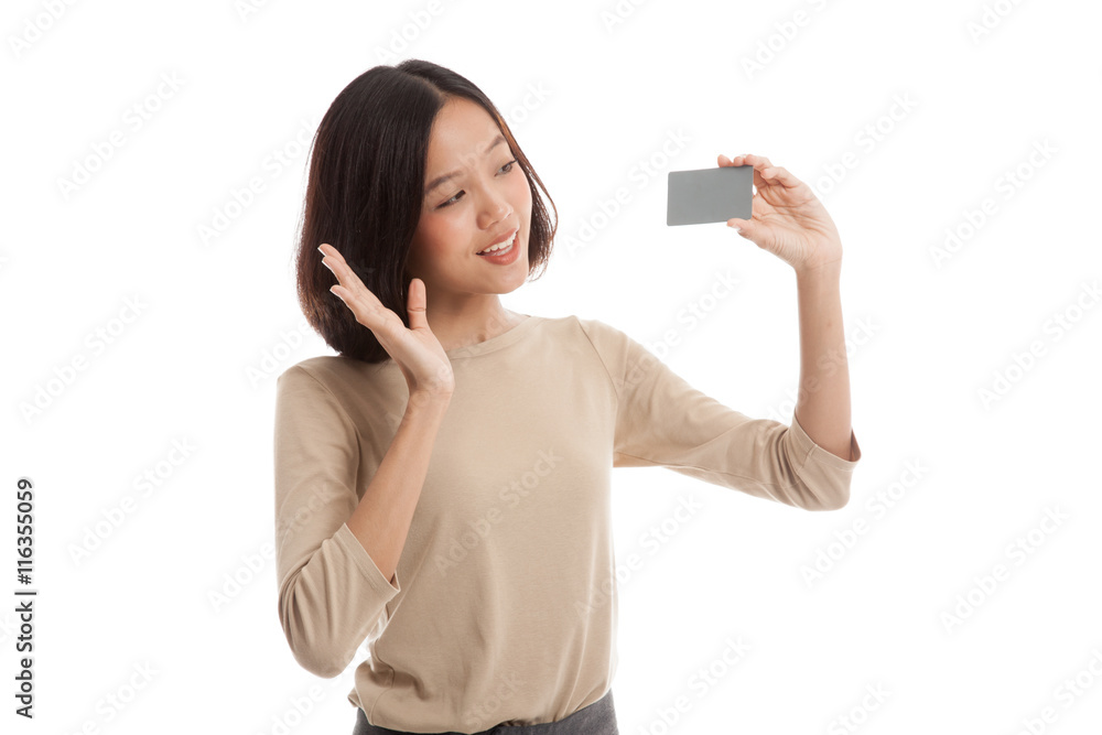 Young Asian business woman happy with blank card isolated on white background Young Asian business woman happy with blank card isolated on white background
