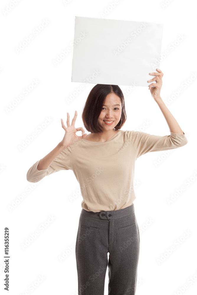 Young Asian business woman show OK with white blank sign isolated on white background Young Asian business woman show OK with white blank sign isolated on white background