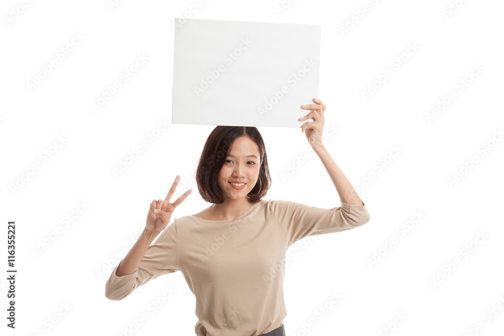 Young Asian business woman show victory sign with blank sign isolated on white background Young Asian business woman show victory sign with blank sign isolated on white background