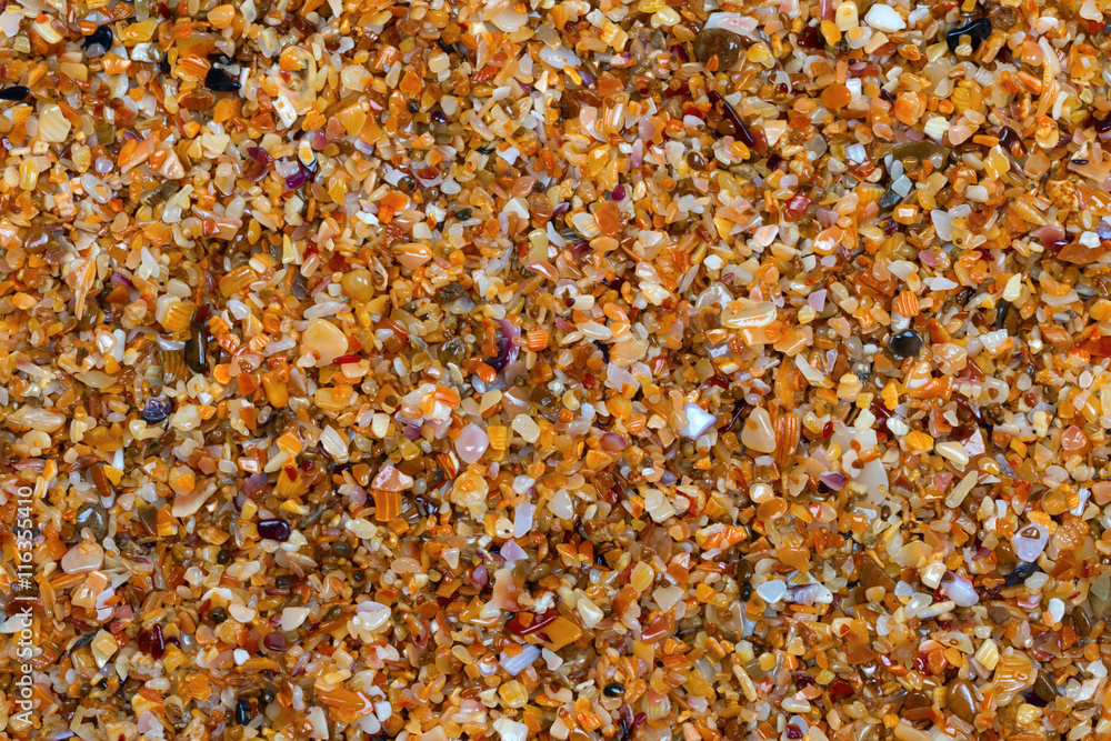 Multicolor sand on beach in sun summer day Multicolor sand on beach in sun summer day