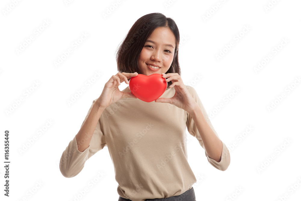 Asian business woman with red heart isolated on white background Asian business woman with red heart isolated on white background