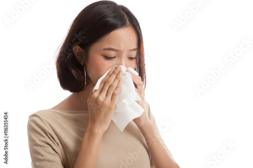 Young Asian woman got sick and flu isolated on white background