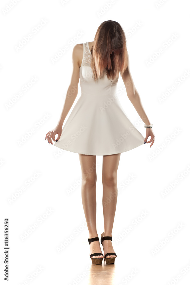 young beautiful woman in a white summer dress young beautiful woman in a white summer dress