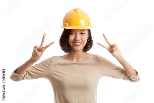 Asian engineer woman show victory sign with both hands isolated on white background