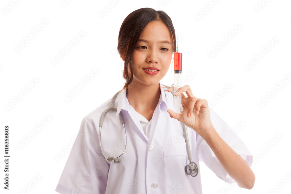 Young Asian female doctor smile hold syringe isolated on white background Young Asian female doctor smile hold syringe isolated on white background