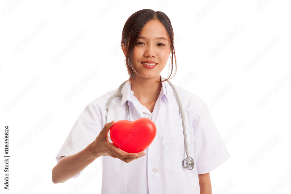 Young Asian female doctor with red heart isolated on white background Young Asian female doctor with red heart isolated on white background