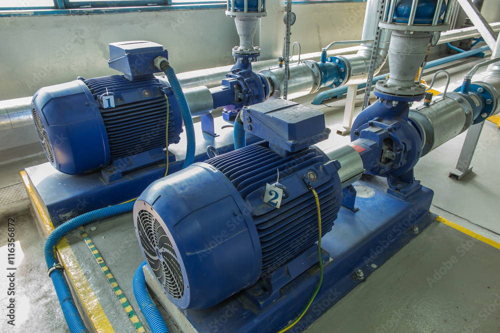 several water pumps with large motors several water pumps with large motors