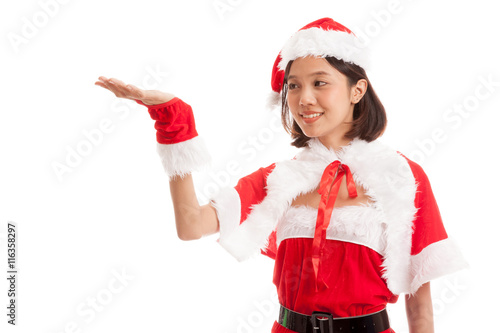 Asian Christmas Santa Claus girl present space on her hand isolated on white background