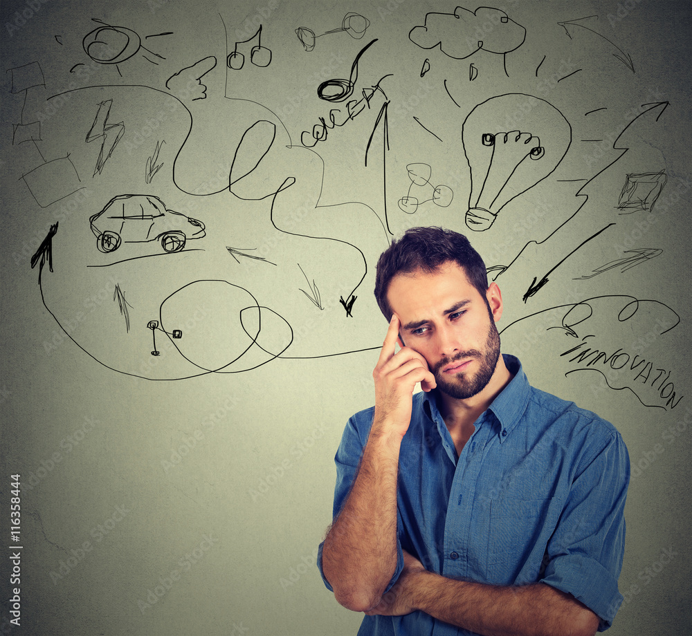 young man planning future life, idea light bulb above head young man planning future life, idea light bulb above head